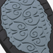 Close-up of a textured blue surface with intricate patterns on a black background