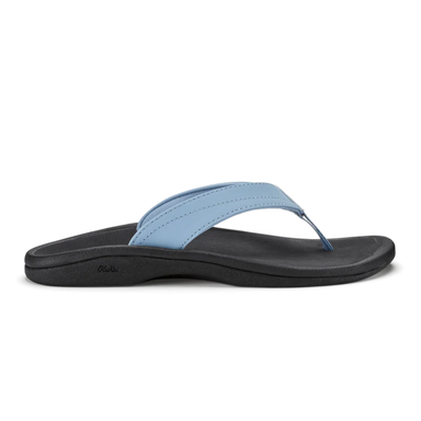 Blue sandal with black sole on a white background