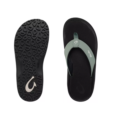 Black flip-flop sandal with a textured sole on a white background
