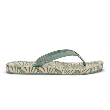Green floral-patterned sandal on a white background