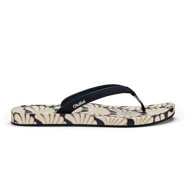 Flip-flop with floral pattern and black strap on a white background