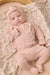 baby girl wearing Rylee + Cru Ribbed Knotted Headband in Dusty Rose