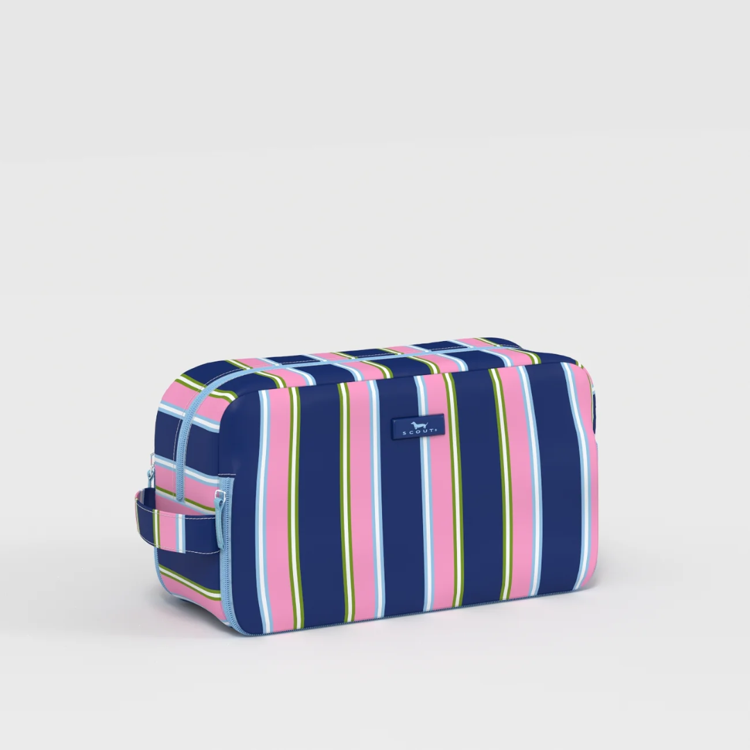 Striped toiletry bag with a visible brand logo on a light gray background