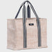 Beige tote bag with black striped handles on a light gray background