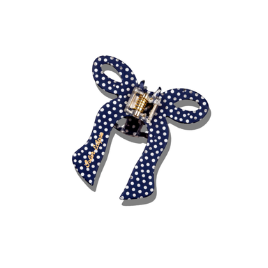 Blue polka dot bow-shaped lock on a white background