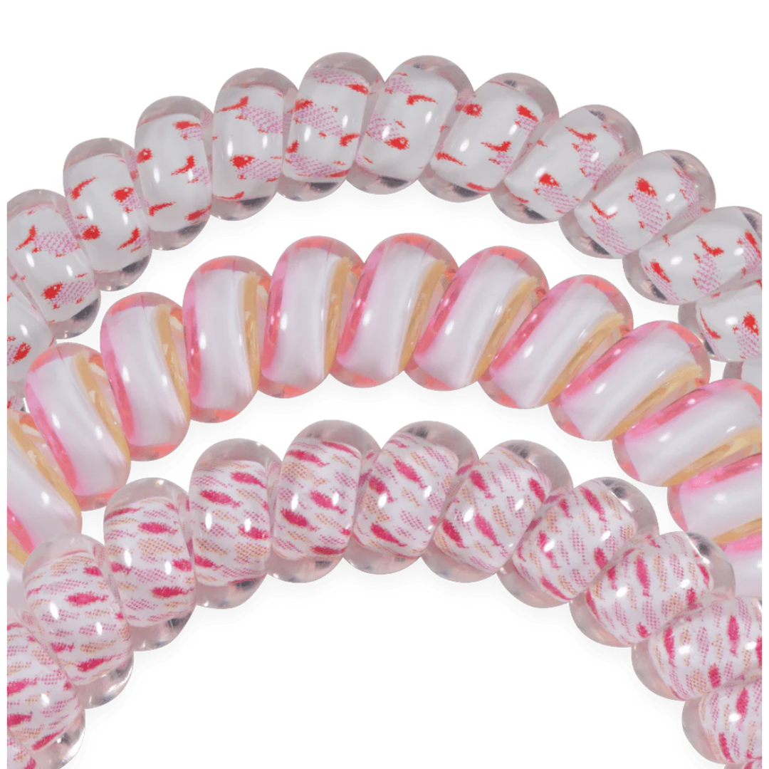 pink hairtie on white background