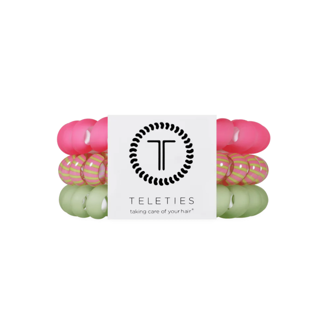 group of three hairties against white background