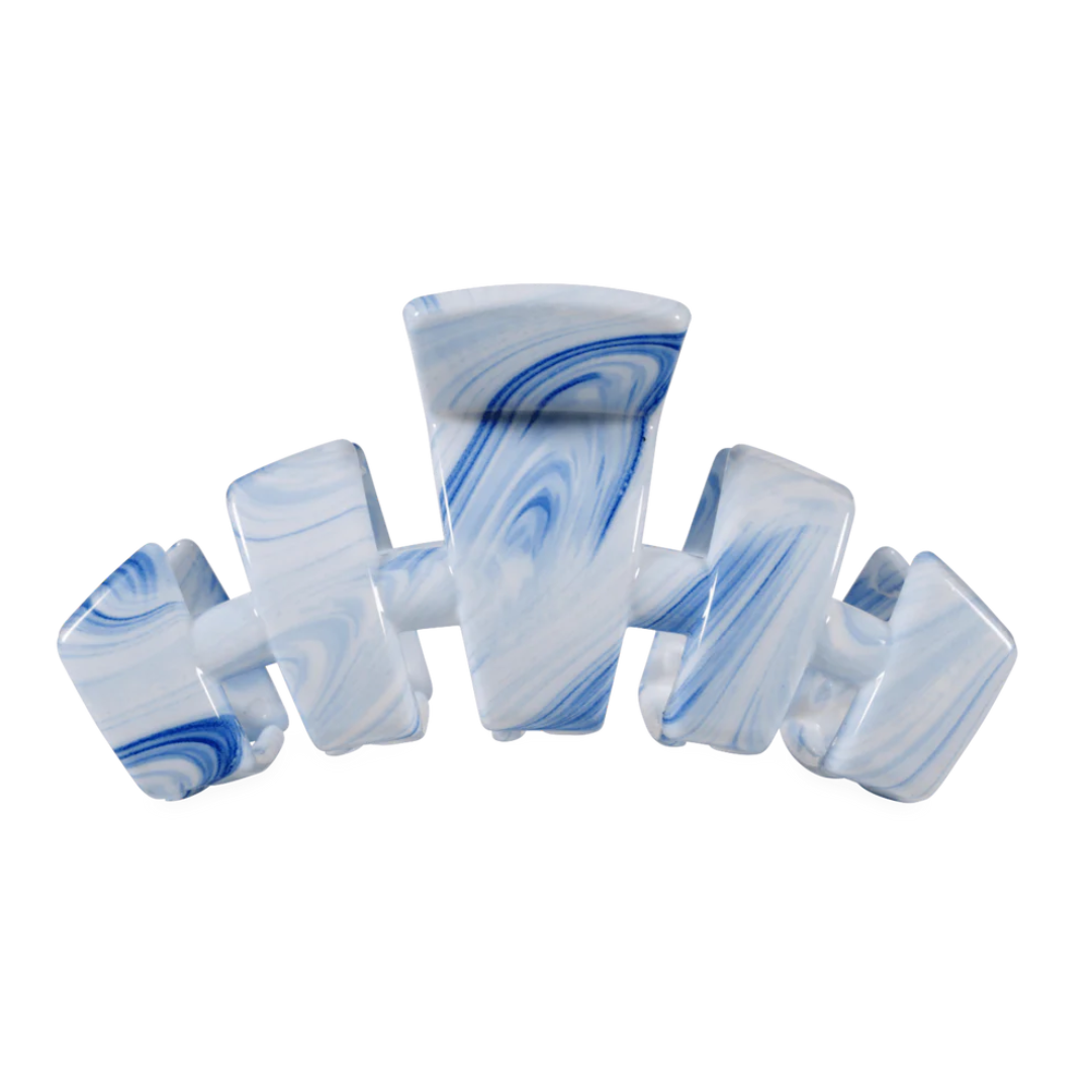 Marble-patterned earbud on a white background