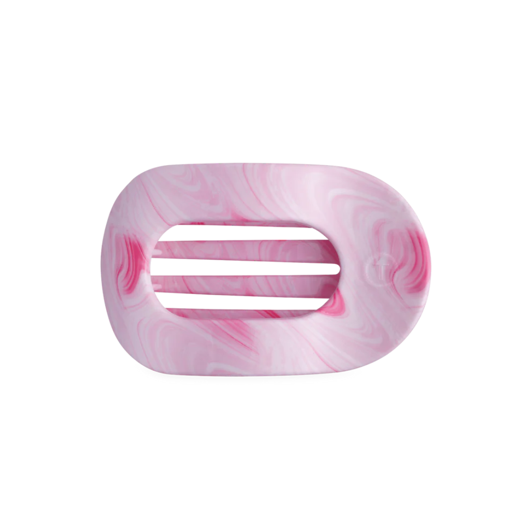 pink hair clip agaist white background