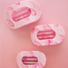 pink hair clips against pink background