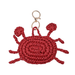 A red crocheted crab-shaped keychain bag with gold-tone metal key rings, shown on a plain white background.