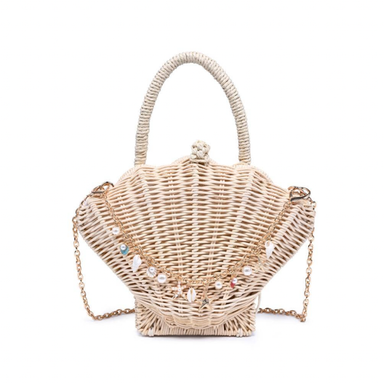 Woven handbag shaped like a shell with decorative elements on a white background