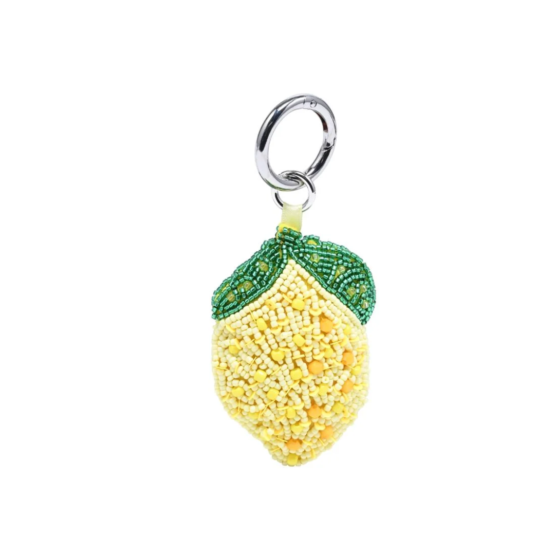 Lemon-shaped beaded keychain on a white background