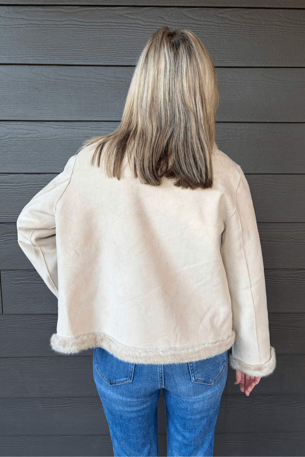 A heather gray hooded long-sleeve henley sweatshirt with a three-button placket and a chest pocket, shown flat against a light gray background.