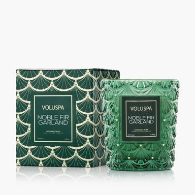 Voluspa Noble Fir Garland candle and packaging on a white background