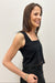 Woman wearing black tank with lace detailing