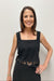 Woman wearing black tank with lace detailing