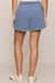 blue shorts with white details on a white background