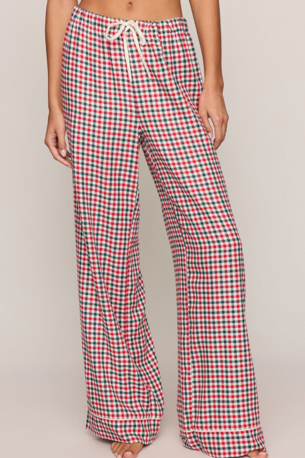 Red, green, and white plaid wide-leg pajama pants with an adjustable white drawstring waist.