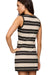 woman wearing black and tan striped mini dress on white background