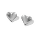 silver heart earring on white background