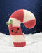 Hand-knit candy cane stuffed toy in a snowy holiday scene