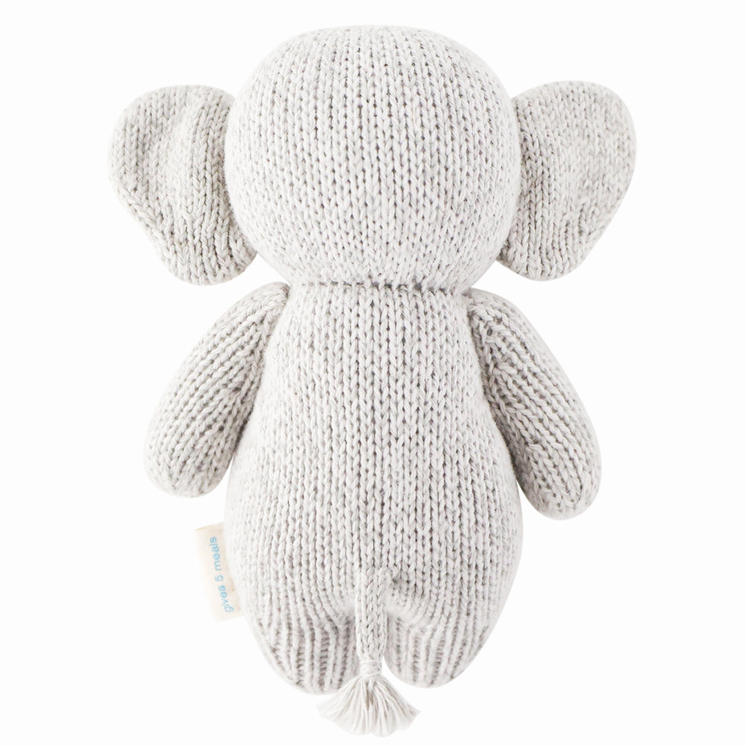 Back view of a hand-knit gray elephant stuffed animal