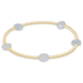 Gold bracelet with gray beads on a white background