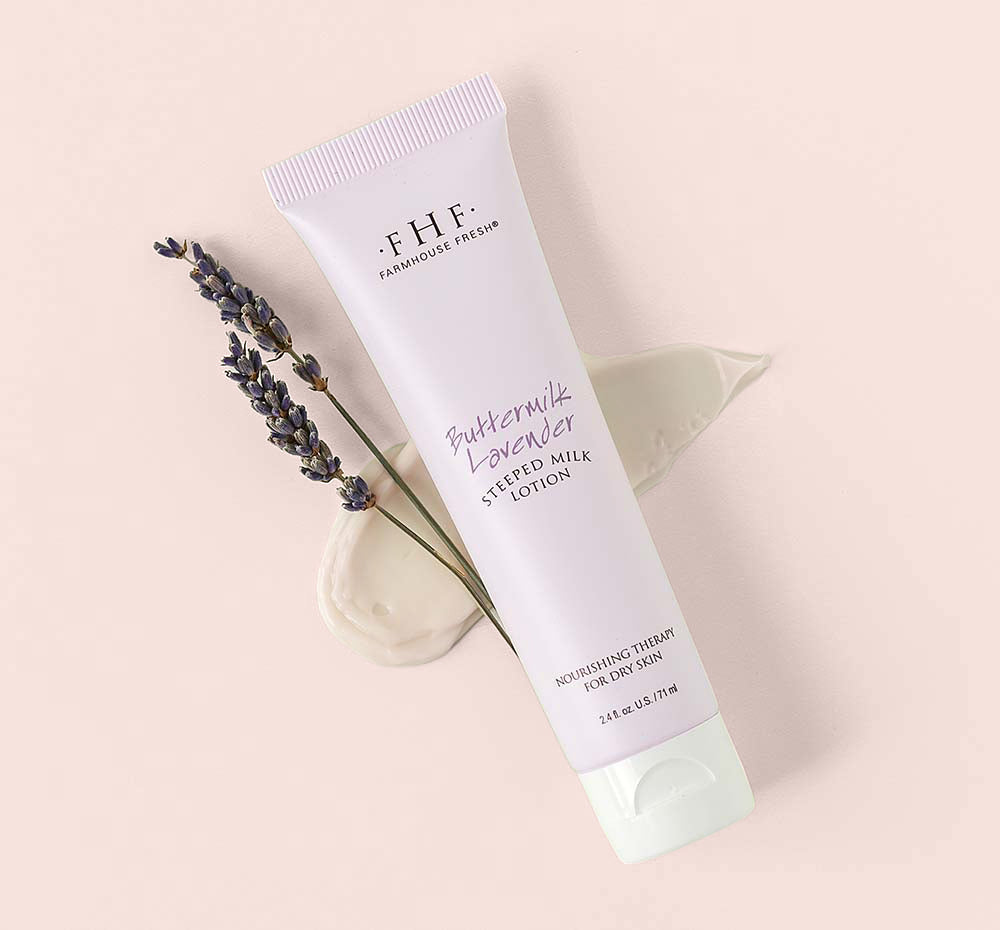 Lavender hand lotion tube on a pink background