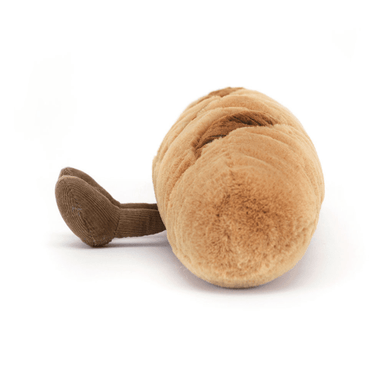 Brown plush toy resembling a dog on a white background
