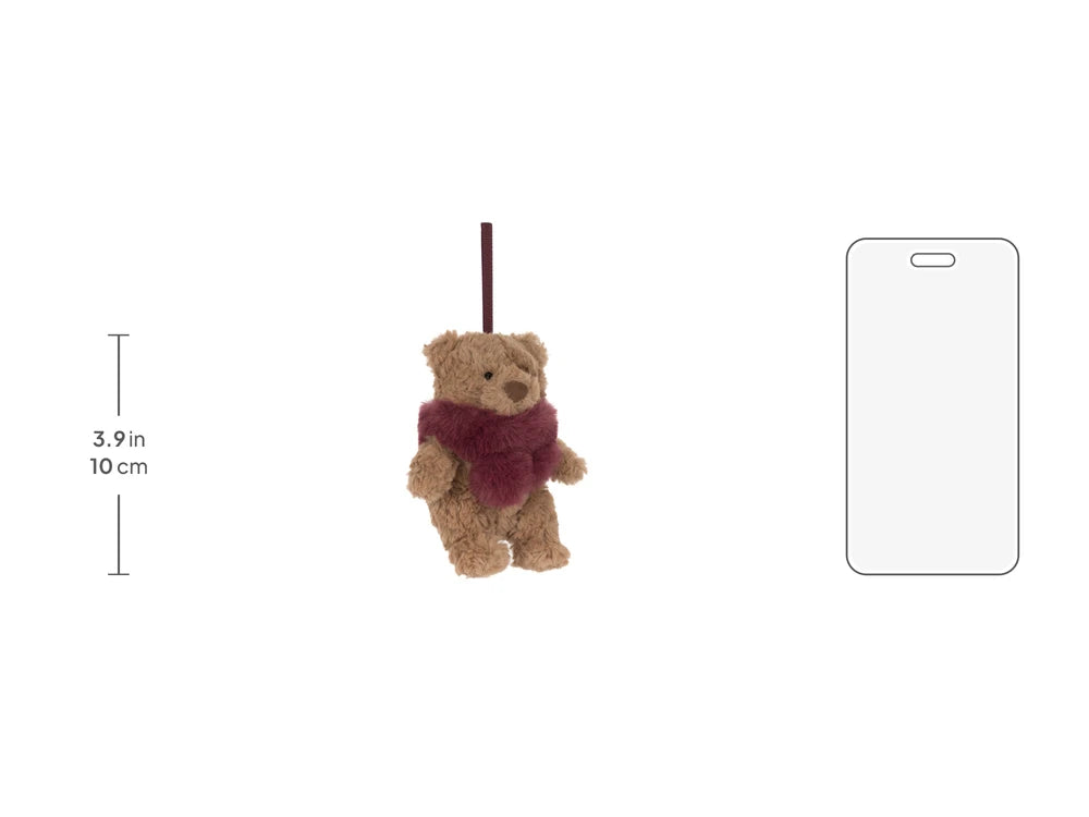 Jellycat Bartholomew Bear holiday decoration wearing a red woolly scarf, size shown next to a 5.5 inch phone