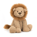 Plush lion toy on a white background