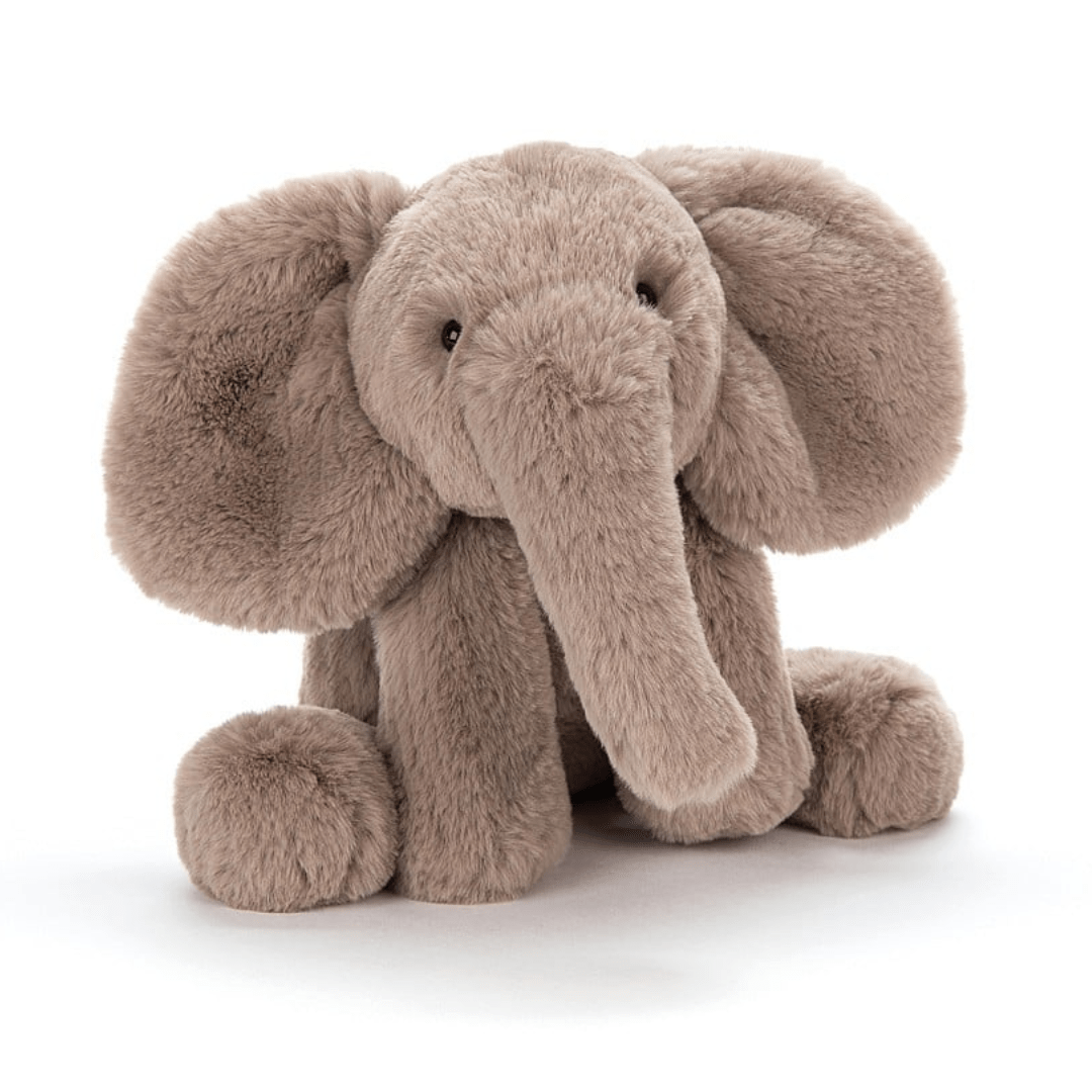 Plush elephant toy on a white background