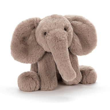 Plush elephant toy on a white background
