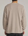 Back view of the washed taupe Katin Mesa waffle knit henley on a model