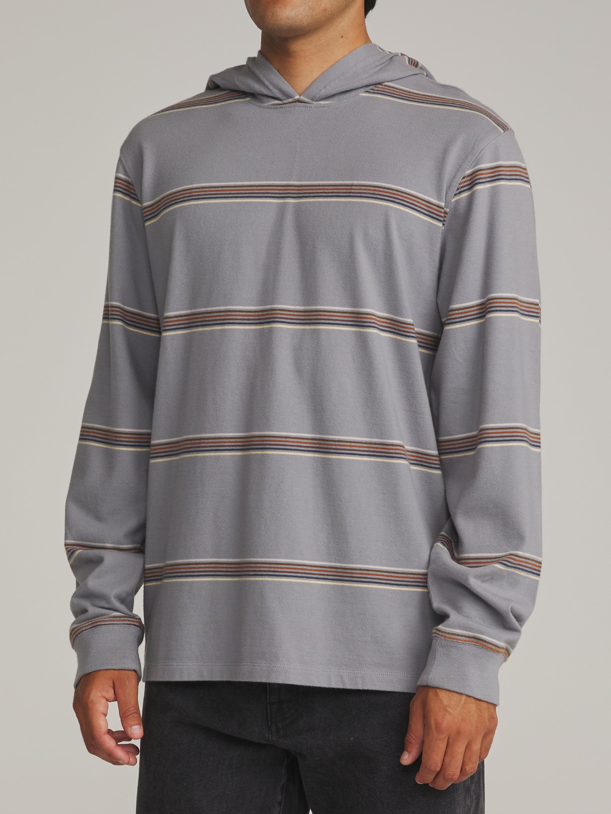 Man wearing the storm blue striped Katin Morris hooded pullover, side view