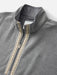 Close-up of the charcoal gray Nelson fleece showing the zipper pull and mock neck
