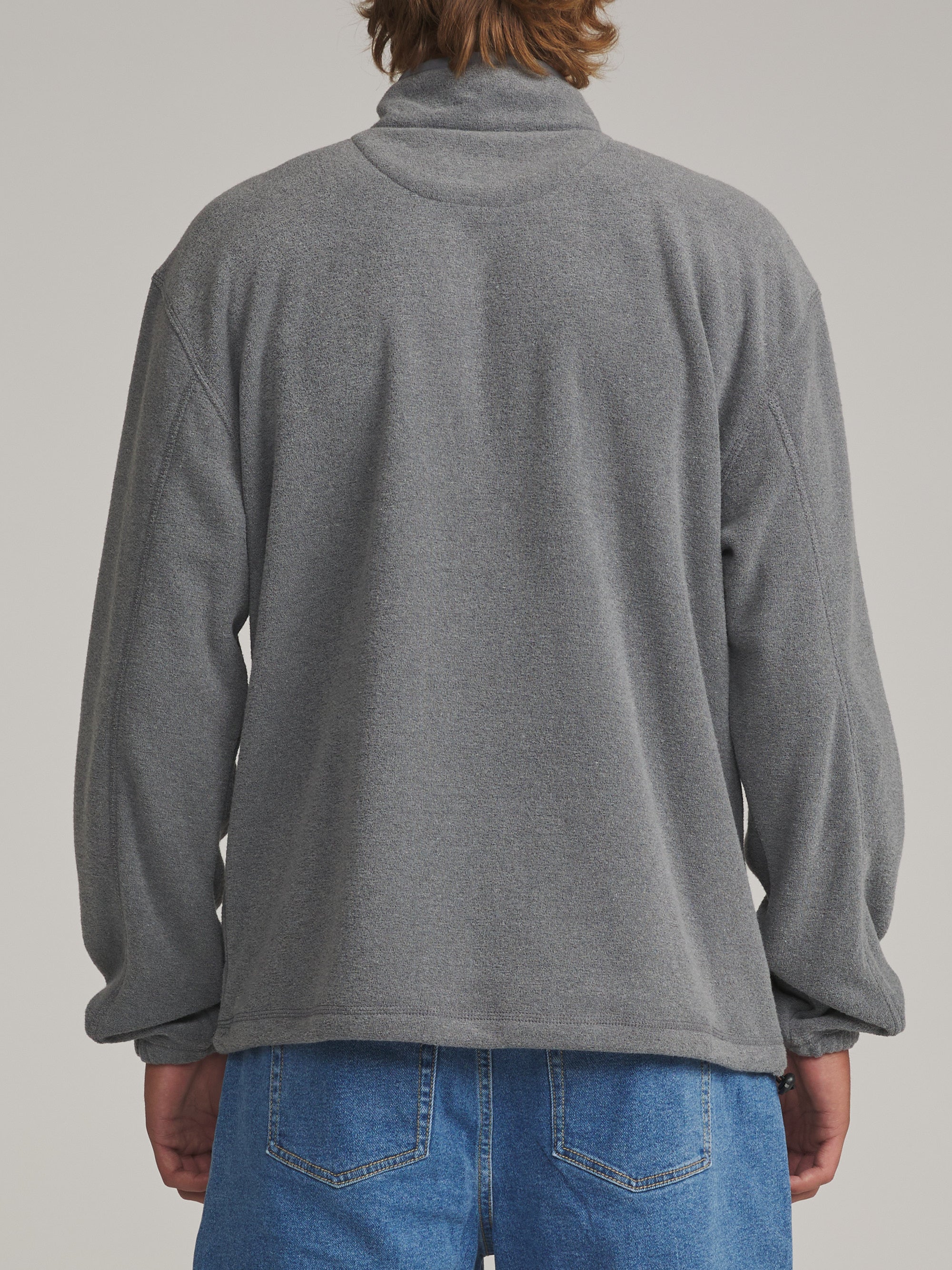 Back view of the charcoal gray Katin Nelson quarter-zip fleece on a model