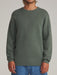 Man wearing the gray green Katin Rivers crew neck sweater, front view