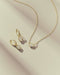 Kendra Scott Mini Ellie Luxe gold huggie earrings in White CZ, view 3