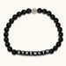 Matte black Jet bead bracelet spelling Strength