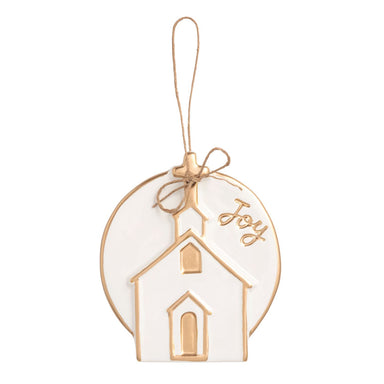 White ceramic disc ornament with a raised gold church