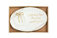 White oval plate with Weary World Rejoices sentiment and gold edge