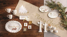 Gold edge sentiment plates displayed with greenery