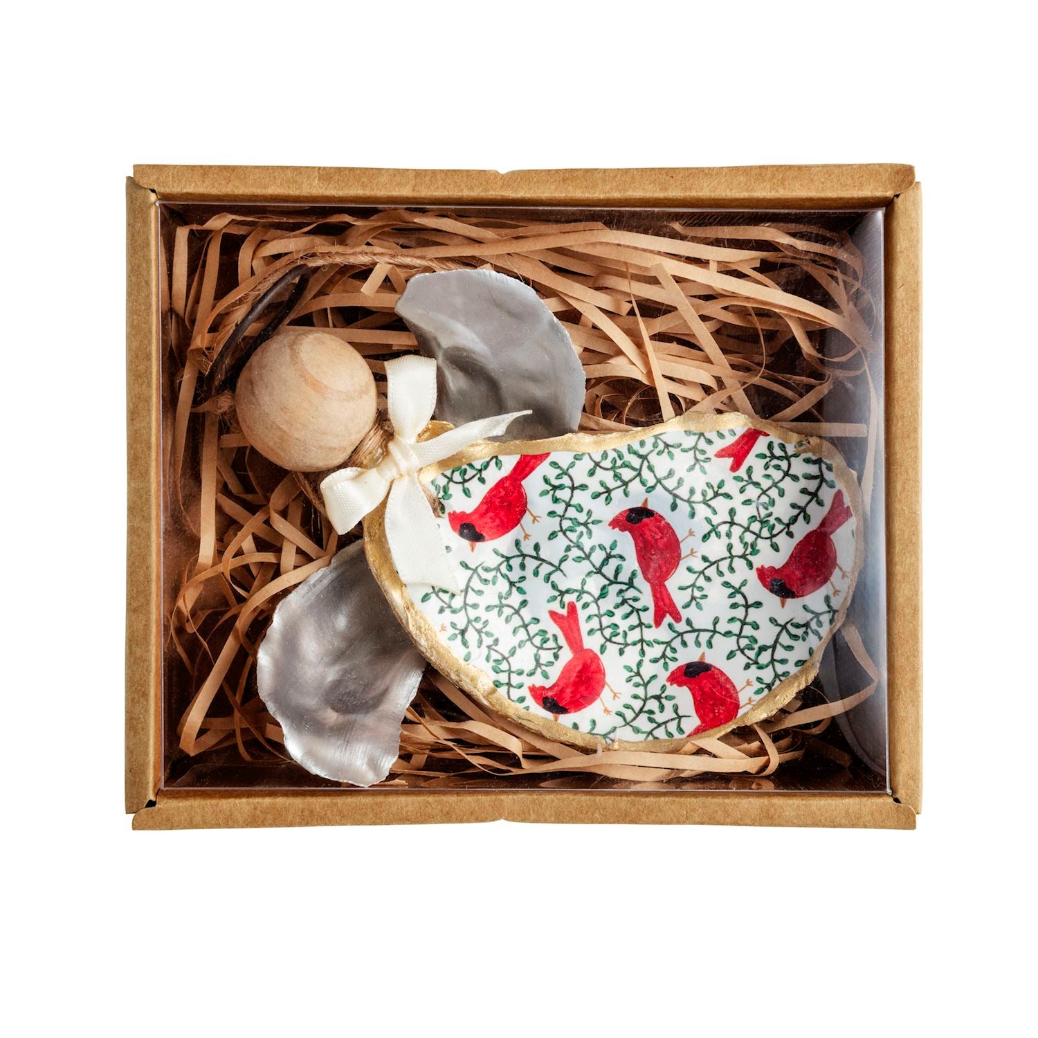 Patterned oyster shell angel ornament in a gift box