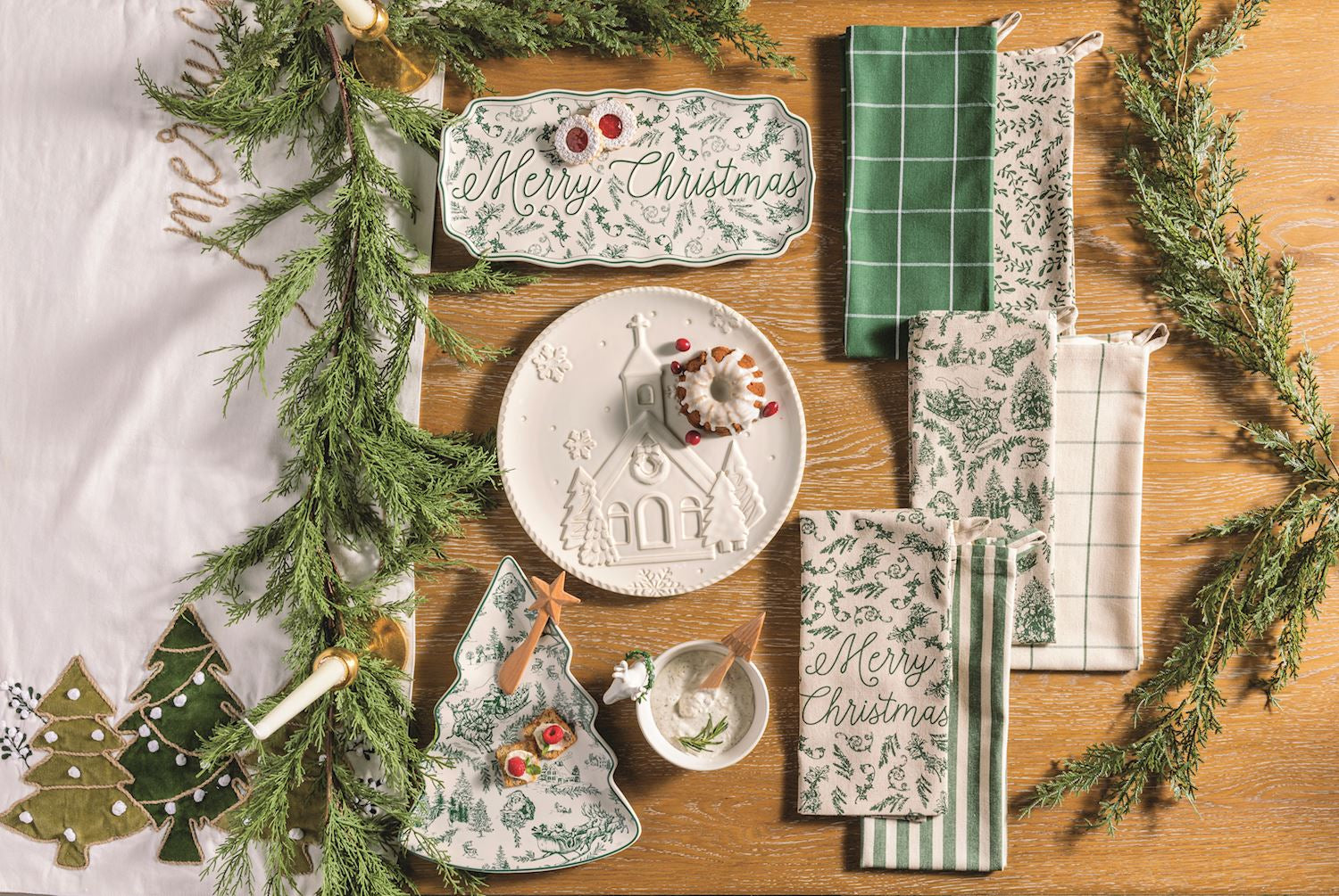 Green toile tray displayed with holiday greenery