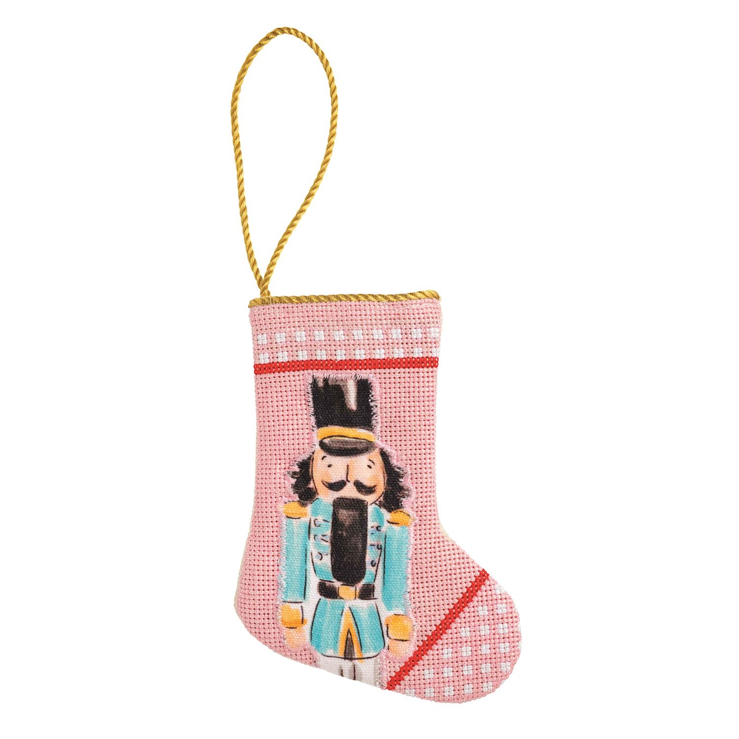 Mini needlepoint stocking with a nutcracker on a pink check background