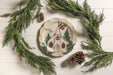 Church platter styled with a pine wreath