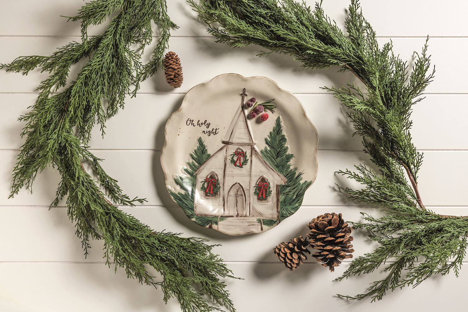 Church platter styled with a pine wreath
