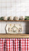 Nativity platter displayed on a kitchen shelf